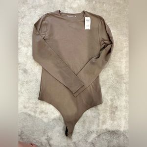 NWT Abercrombie and Fitch body suit. Long sleeve with crew neck.